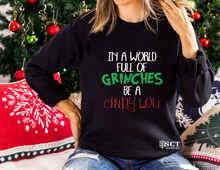 Load image into Gallery viewer, In a world full of Grinches be a Cindy Lou - Unisex Crewneck

