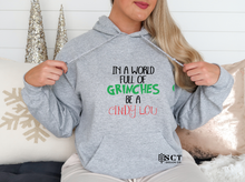 Load image into Gallery viewer, In a world full of Grinches be a Cindy Lou - Unisex Hoodie

