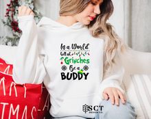 Load image into Gallery viewer, In a world full of Grinches be a Buddy - Unisex Hoodie
