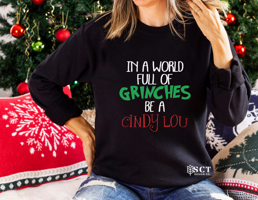 In a world full of Grinches be a Cindy Lou - Unisex Crewneck